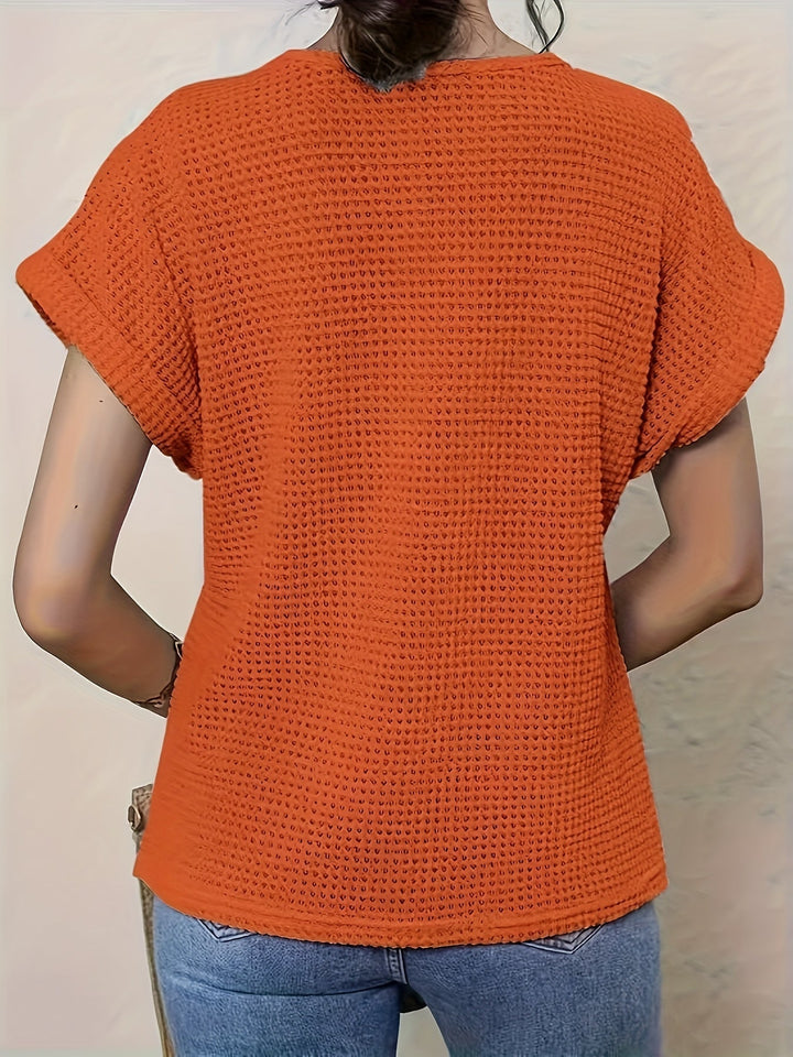 Bohemian chic women's short sleeve top with exquisite crochet, relaxed fit for summer fashion.
