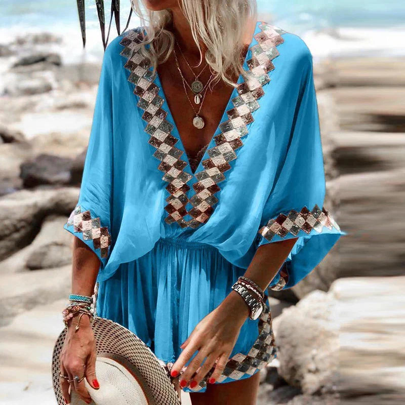 Women's boho V-neck short jumpsuit for summer. Flowy, comfortable one-piece romper, perfect for casual wear & beach vacations.