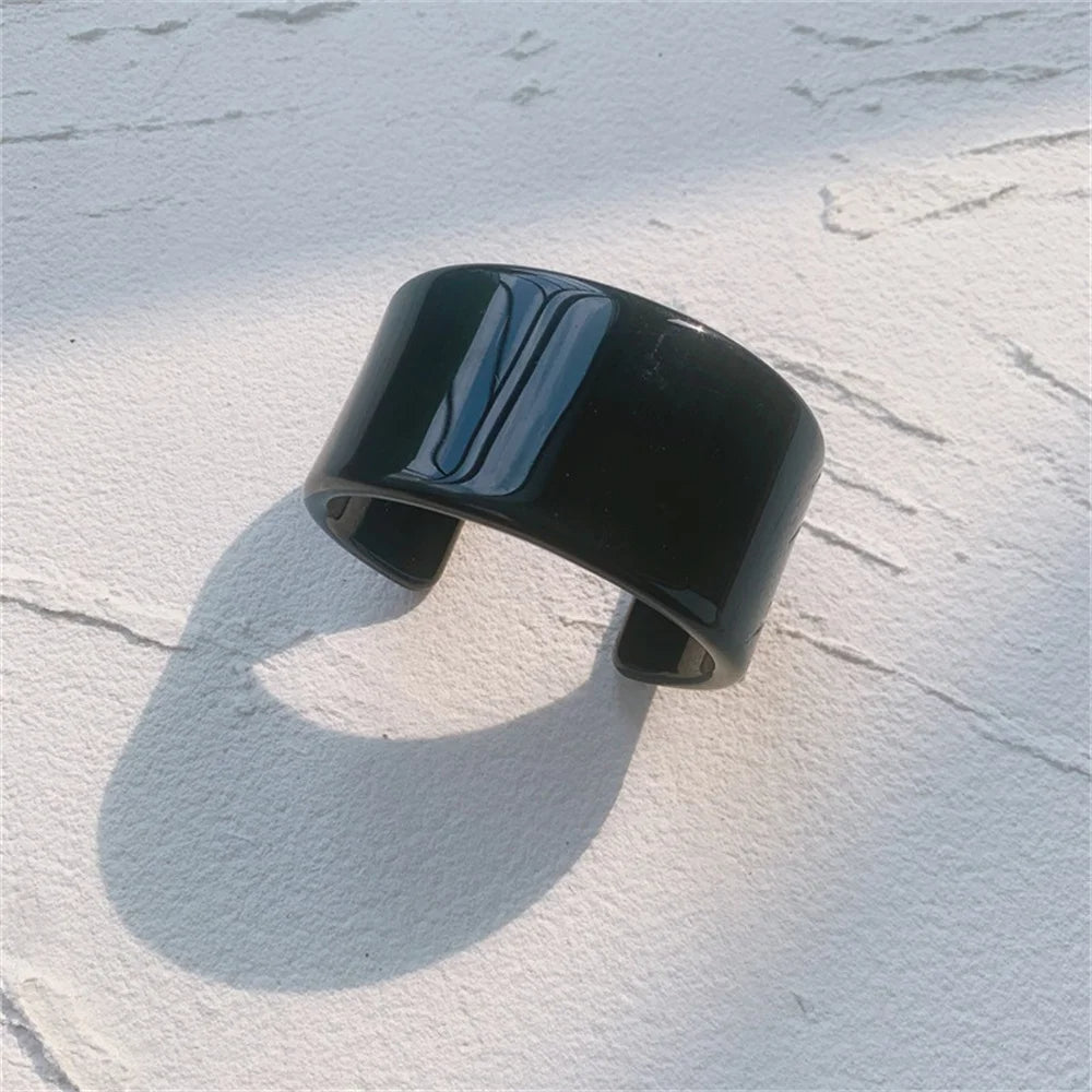 Vibrant acrylic stackable bangle set, chunky women's fashion cuffs.
