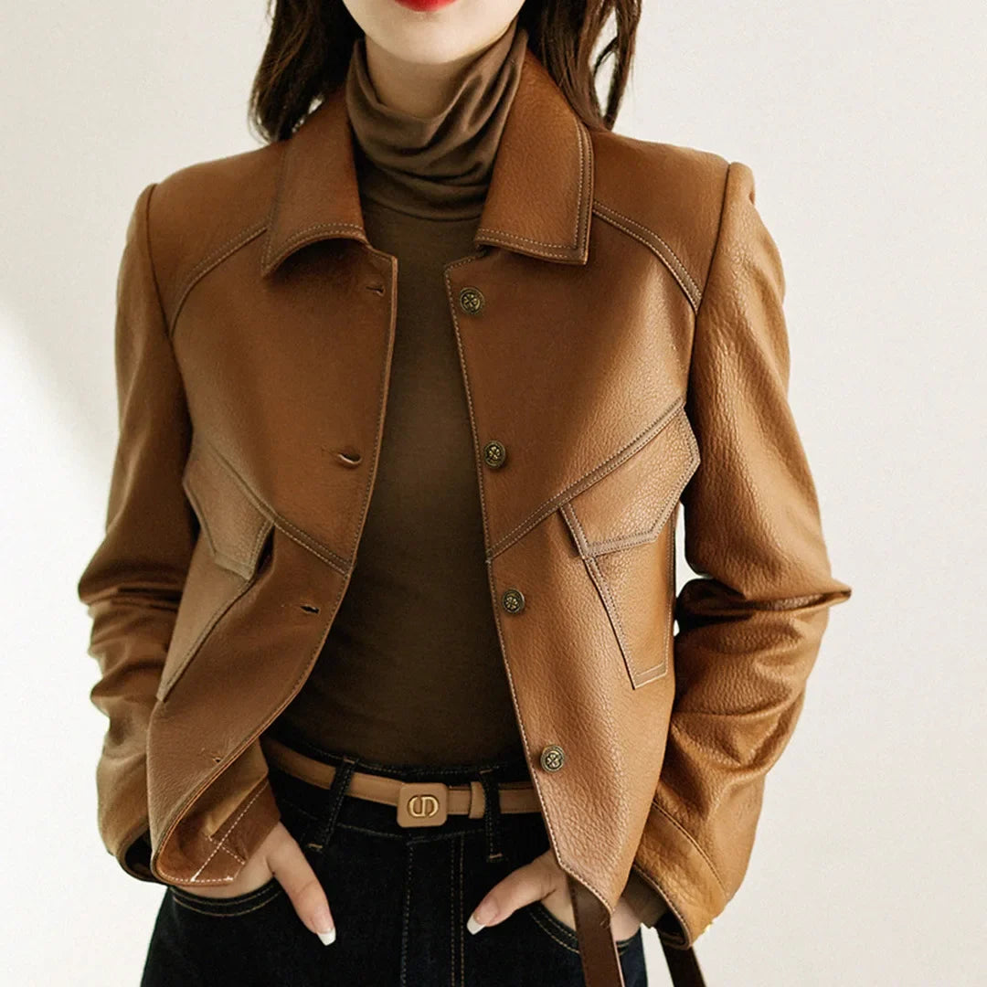 Women's Bold Cropped Moto Jacket. Stylish black biker jacket, edgy fashion statement outerwear.