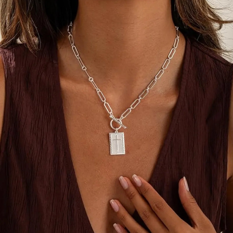 Statement women's paperclip chain necklace with a bold cross pendant, available in gold or silver.