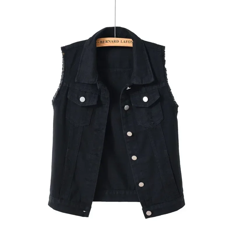 Women's black denim vest, a casual and edgy fashion layering piece.
