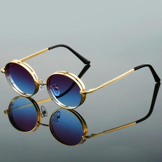 Women's bold round sunglasses with gilded metal frame & UV400 protection. Stylish eye protection accessory.