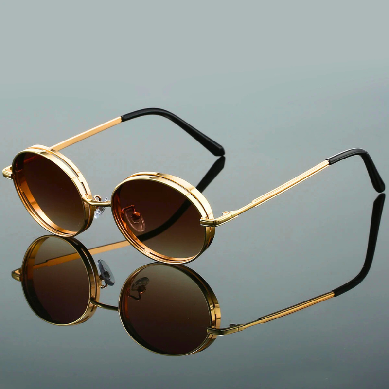 Women's gilded frame bold round sunglasses. UV400 eye protection and a chic fashion accessory.