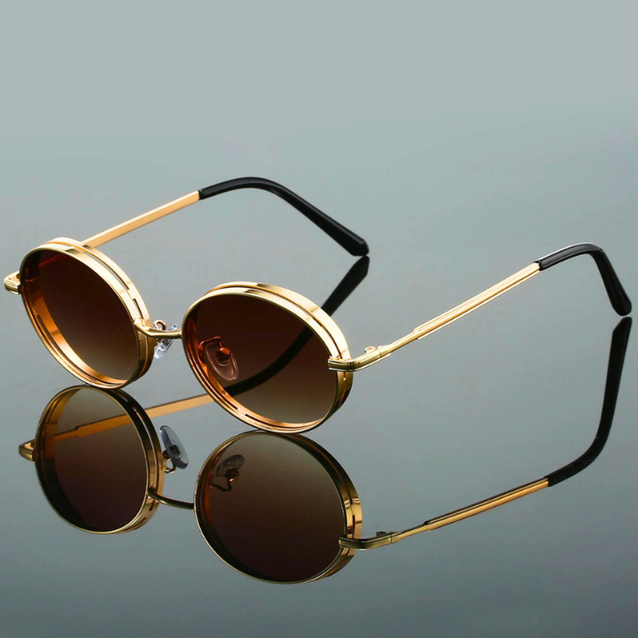 Women's gilded frame bold round sunglasses. UV400 eye protection and a chic fashion accessory.