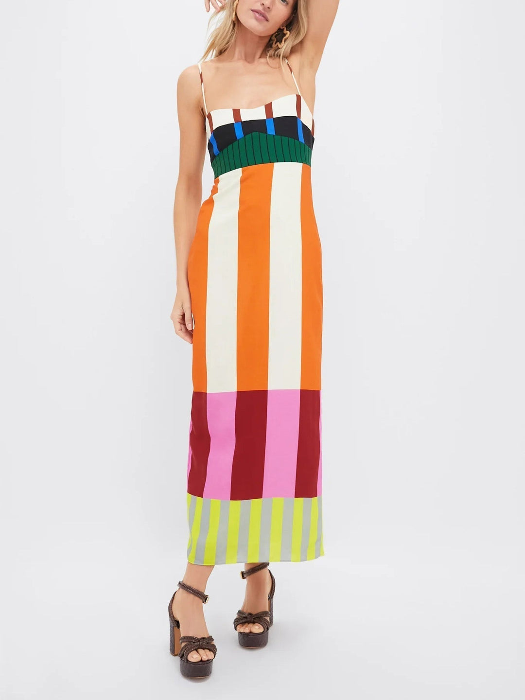 Figure-hugging women's bodycon midi dress featuring bold stripes & delicate spaghetti straps for a trendy look.