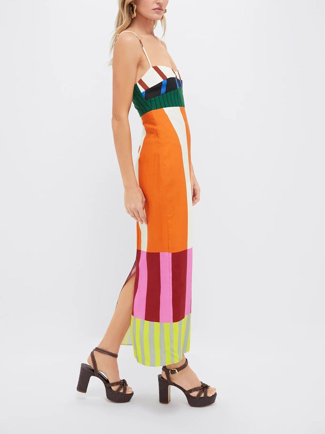 Elegant women's striped spaghetti strap midi dress. Modern bodycon fit suitable for evening or party wear.
