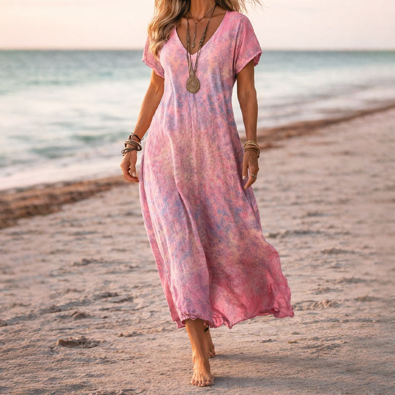 Elegant women's flowy botanical floral maxi dress with a V-neck, ideal for summer parties or vacation.