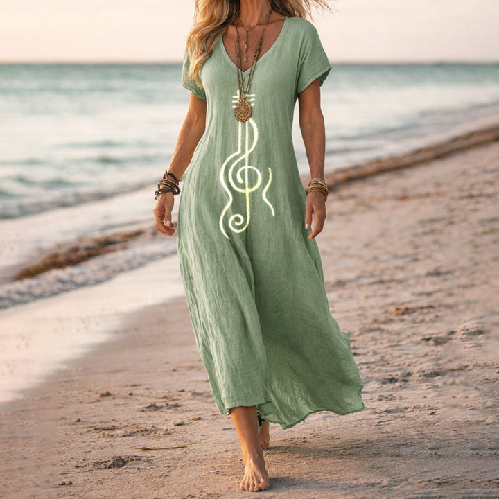 Vibrant botanical floral print women's V-neck flowy maxi dress, versatile for beach, party, or casual events.