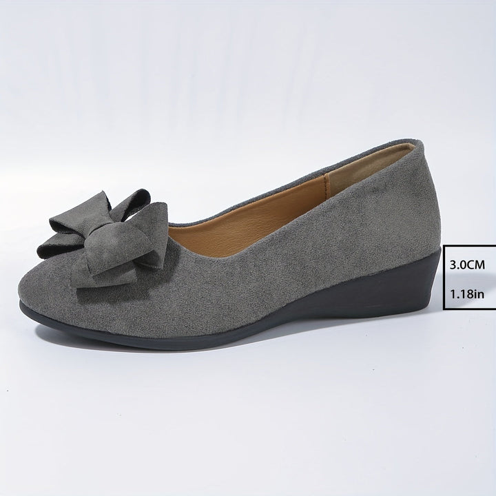 Gray women's work-appropriate wedge ballet flats, round toe, slip-on, with a bow.