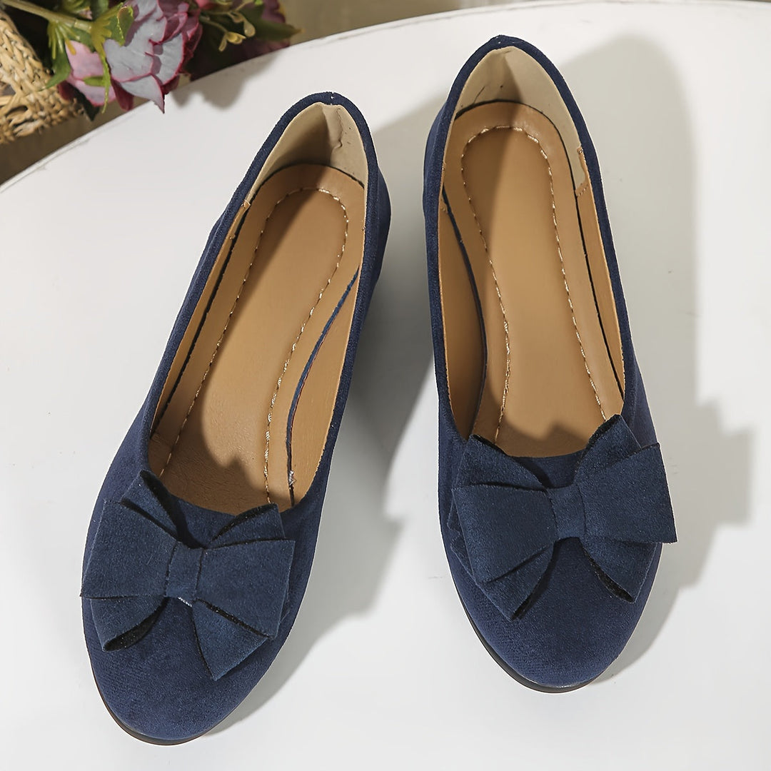 Women's bow detail round toe wedge ballet flats for versatile everyday styling.