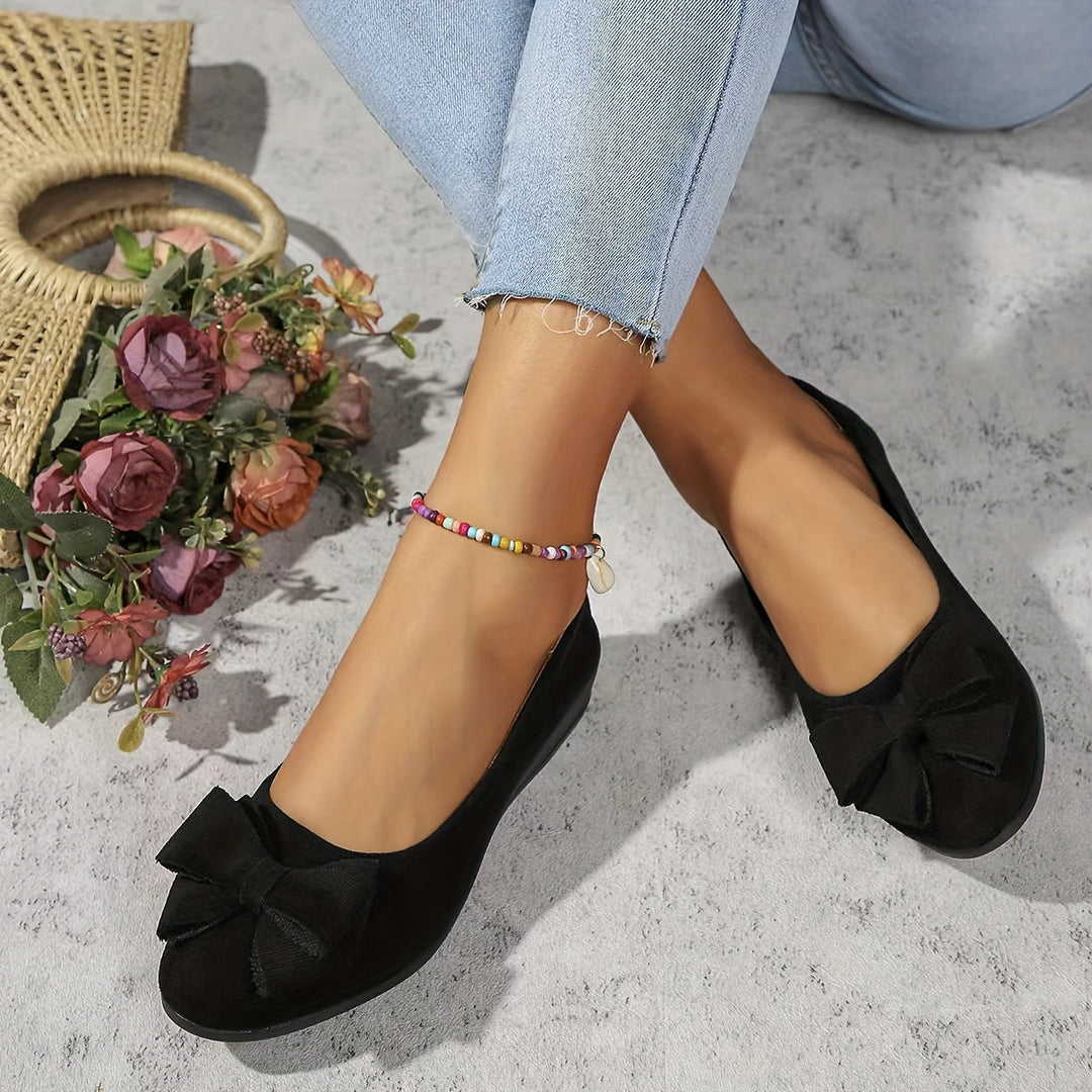 Black comfortable women's round toe wedge ballet flats, elegant bow, slip-on design.