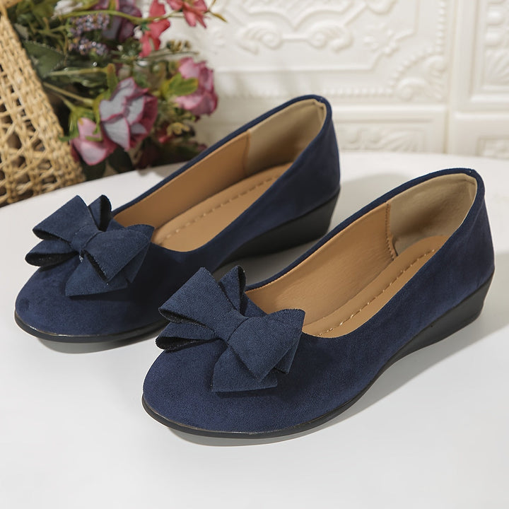 Women's elegant round toe slip-on wedge ballet flats, bow detail, perfect for comfort.