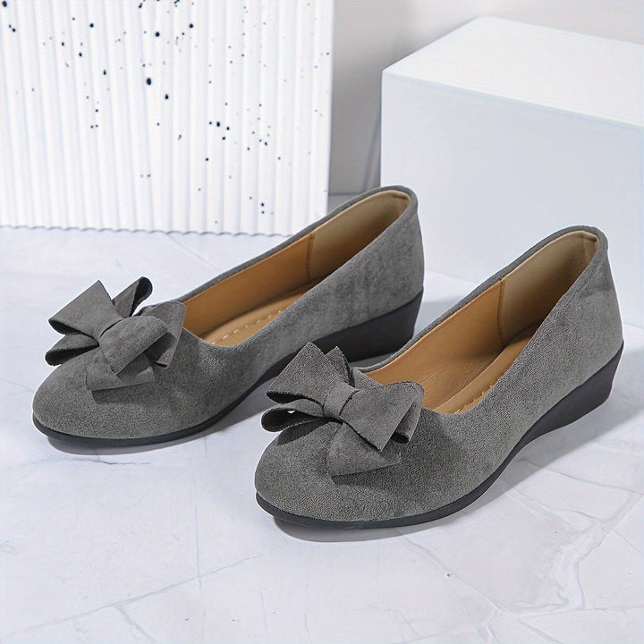 Navy women's everyday slip-on wedge ballet flats, round toe, bow, versatile & comfy.