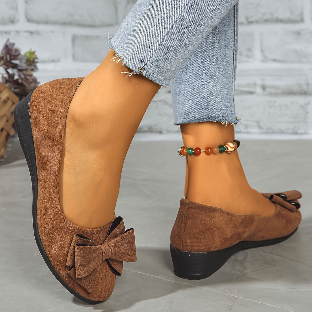 Taupe women's round toe wedge ballet flats, comfortable & feminine with a bow.