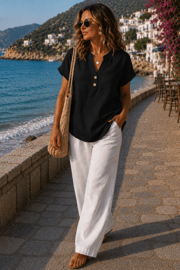Women's breathable button-up blouse in a relaxed fit, perfect for casual spring and summer style.