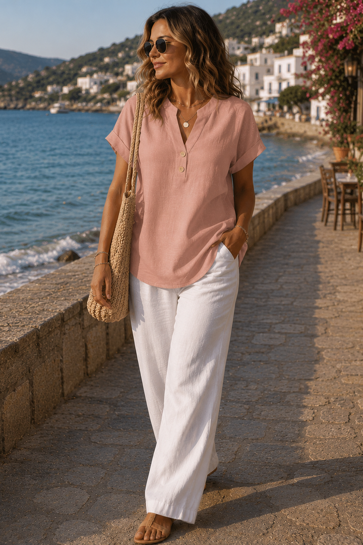 Stylish women's relaxed fit button-up top, a breathable long sleeve blouse for versatile everyday wear.