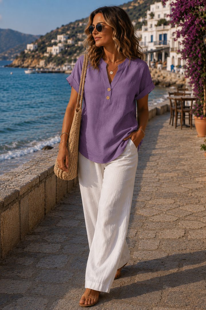 Effortless women's summer button-up blouse, breathable long sleeve design for comfy casual or office wear.