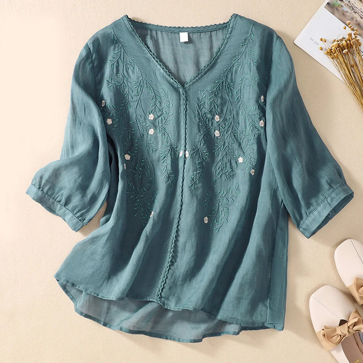 Women's breathable embroidered shirt, a flowy blouse with artistic detail for summer casual elegance.