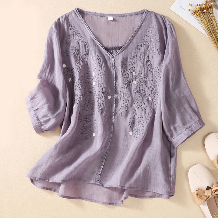 Comfortable women's loose-fit embroidered top, a breathable blouse perfect for everyday summer style.