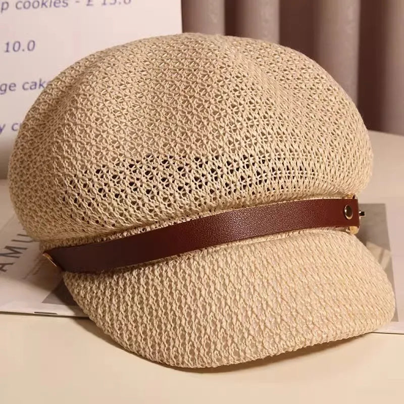 Elegant women's knitted sun hat, breathable and lightweight, ideal for beachwear and summer fashion.