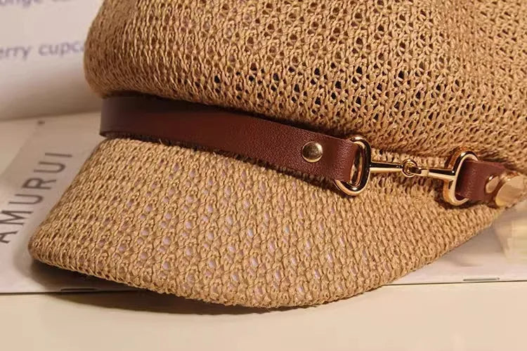 Knitted women's sun hat with a wide brim for summer protection. Breathable and lightweight, a perfect beach accessory.