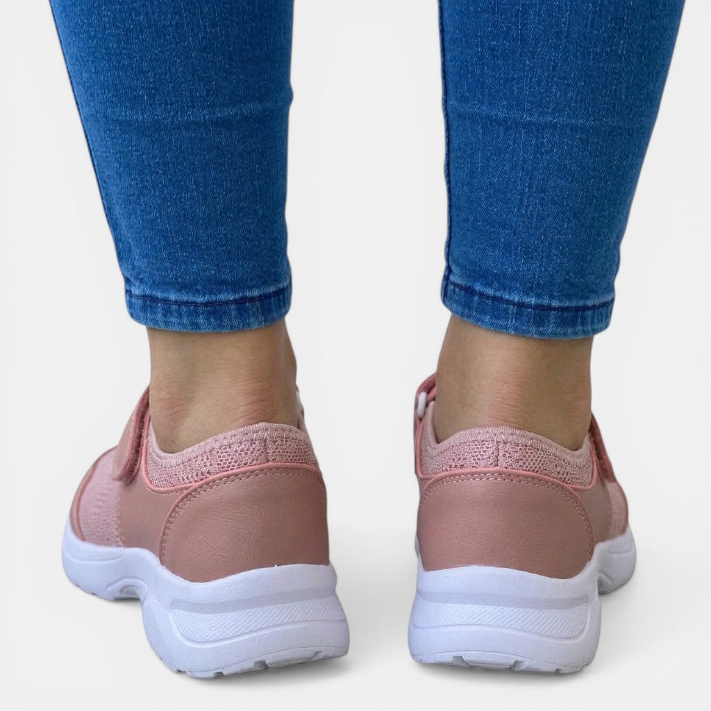 Breathable mesh slip-on sneakers for women, offering foot support & all-day walking comfort.