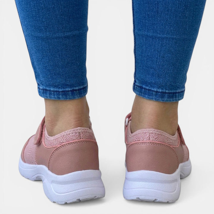 Breathable mesh slip-on sneakers for women, offering foot support & all-day walking comfort.