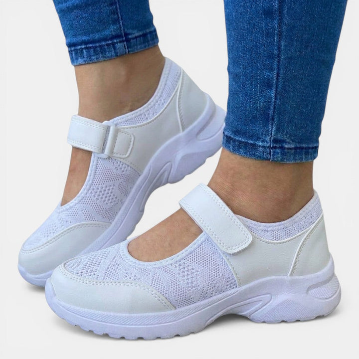 Pink women's orthopedic slip-on sneakers, breathable and comfortable for everyday walks.