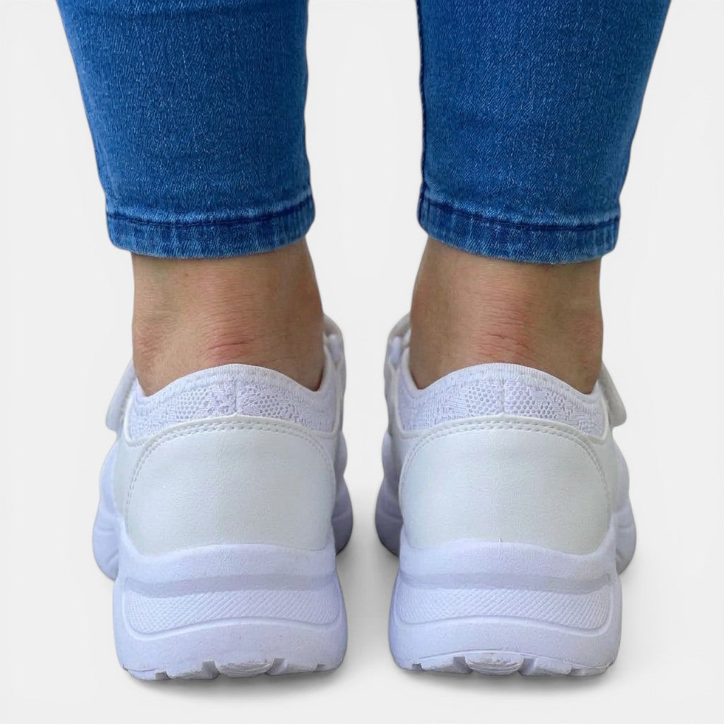 Blue women's breathable orthopedic slip-on sneakers, providing foot support & comfort.