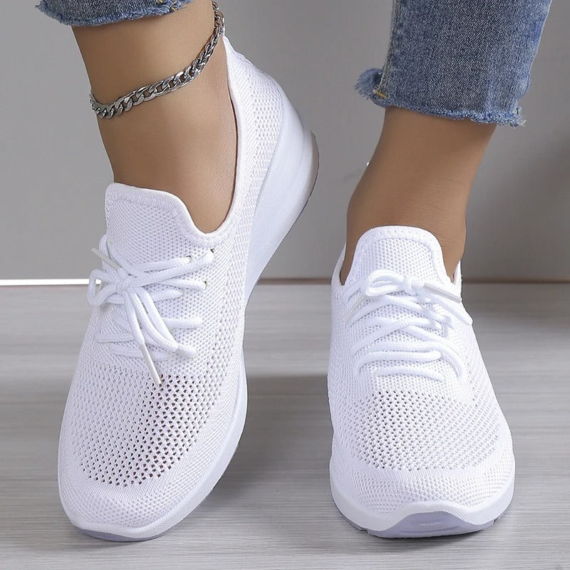 Versatile women's breathable platform wedge sneakers, ideal for casual wear and fashion elevation.