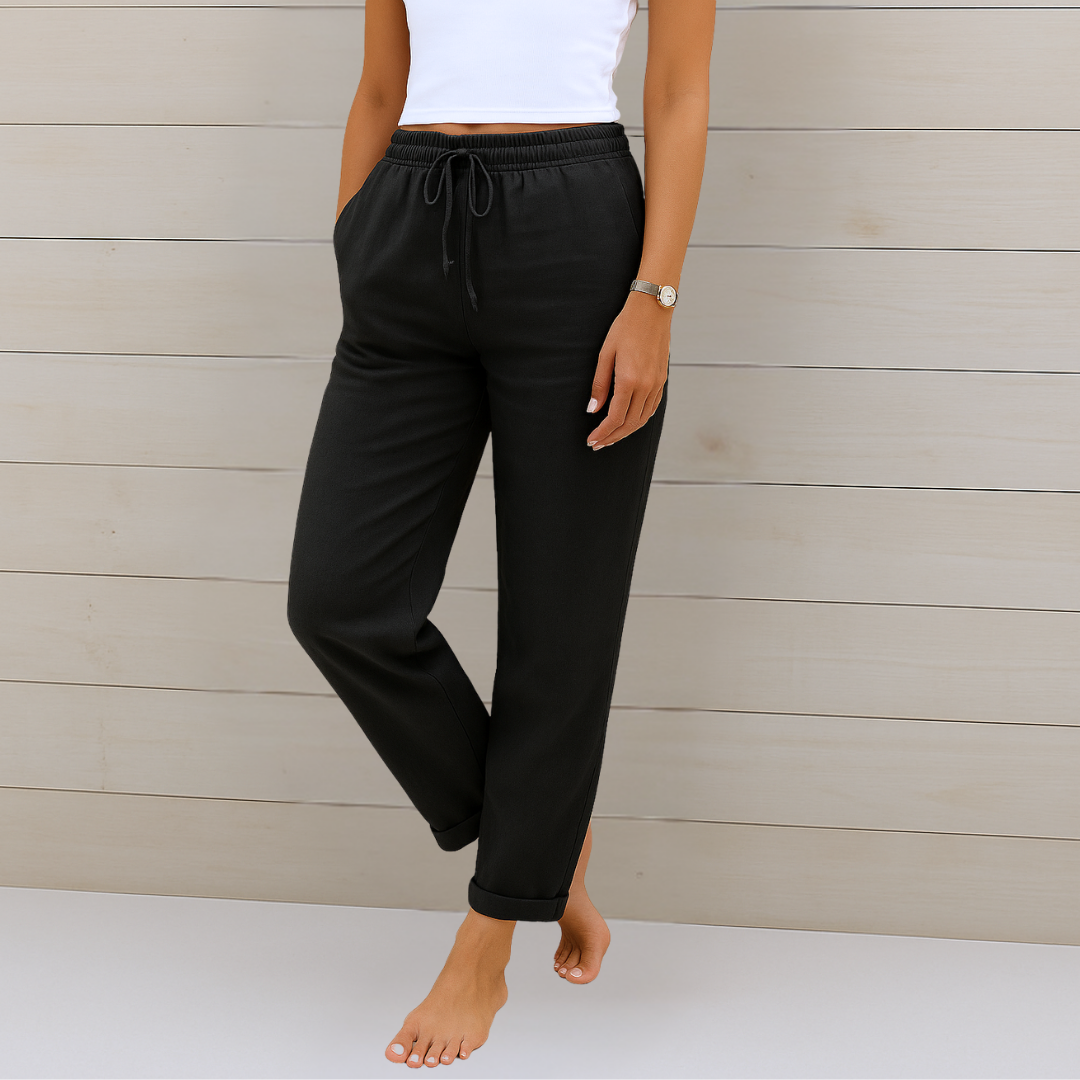 Woman showcasing breathable, relaxed fit women's trousers with elastic waist for comfortable movement and style.