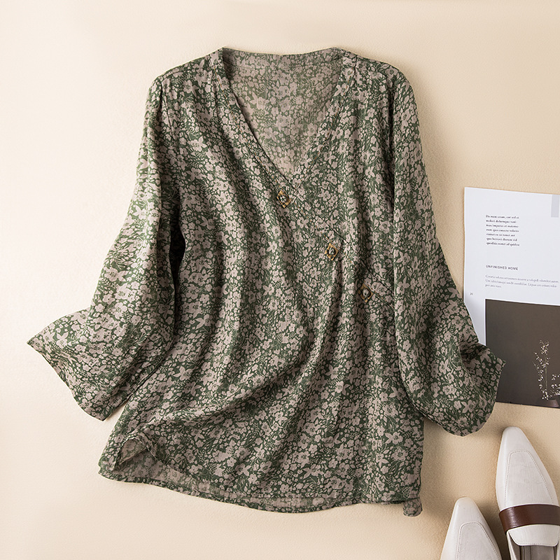 Elegant women's patterned crossover blouse; a relaxed fit, casual chic top for spring and summer.