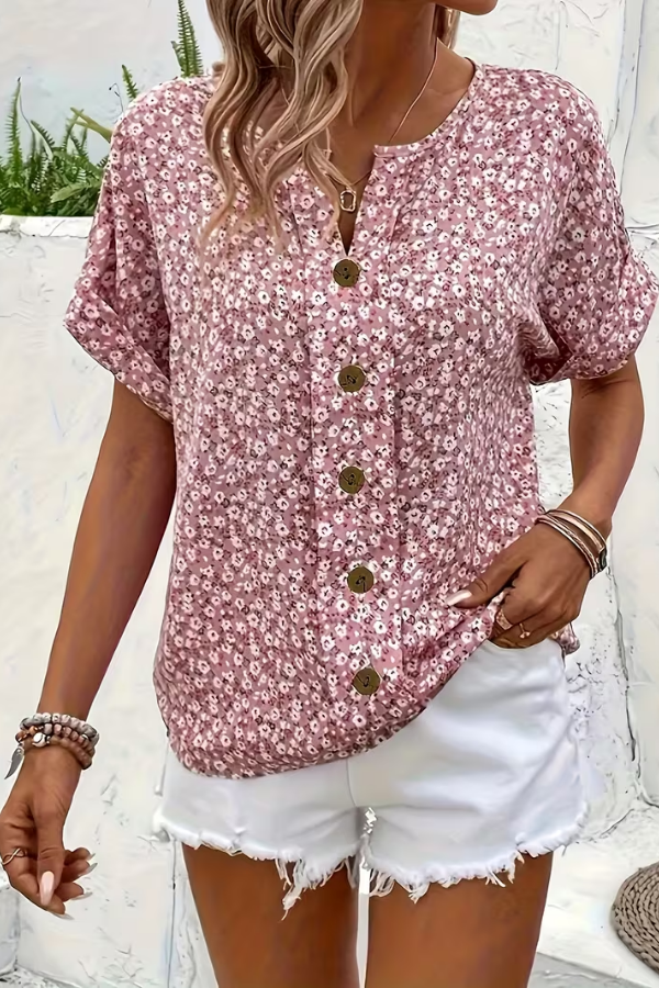 Effortless women's floral summer shirt with short sleeves. A lightweight and breezy top for everyday style.