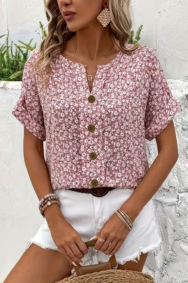 Lightweight women's floral blouse with short sleeves, ideal for breezy summer days. Casual and effortless everyday top.