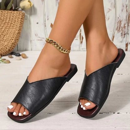 Women's breezy open-toe flats for ultimate summer comfort. Lightweight casual slip-on footwear.