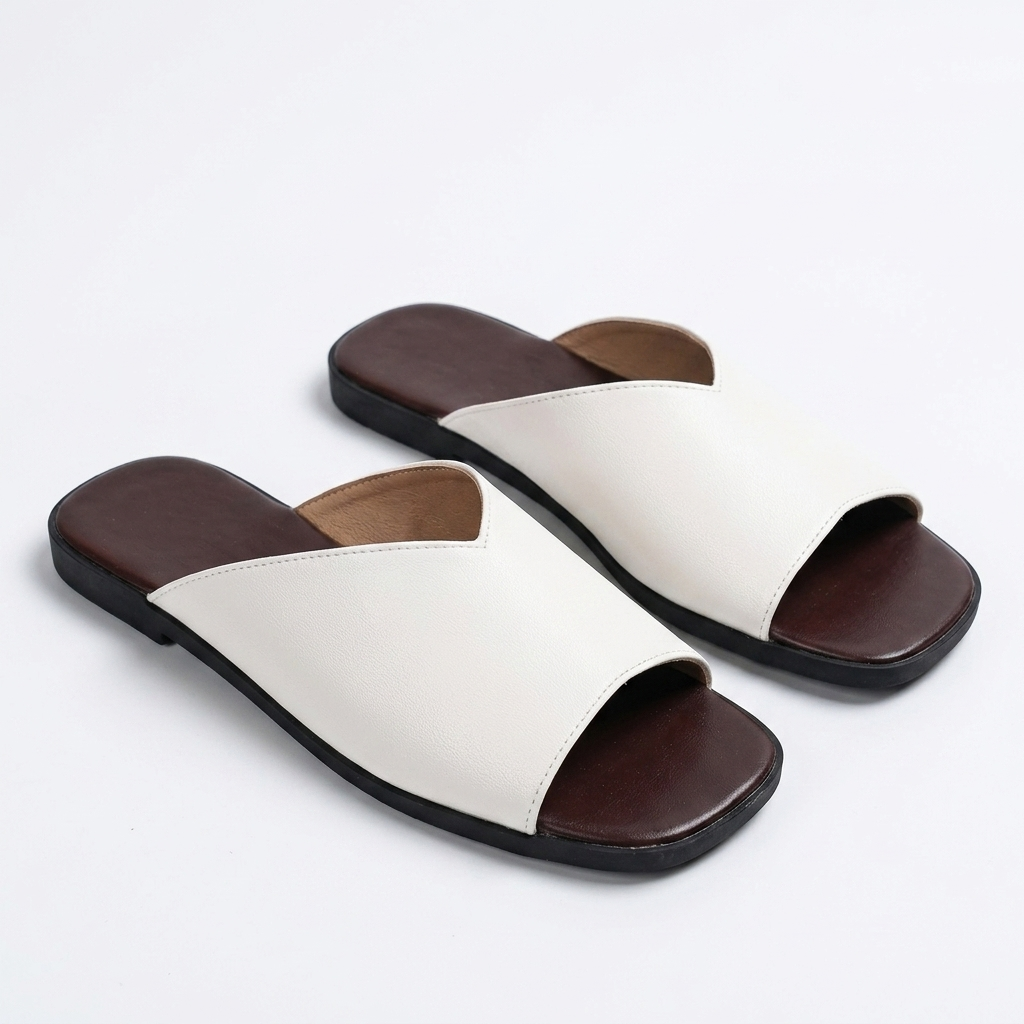 Women's versatile open-toe flats, essential breezy slip-on footwear for a comfortable summer.