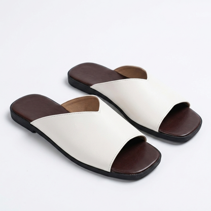 Women's versatile open-toe flats, essential breezy slip-on footwear for a comfortable summer.