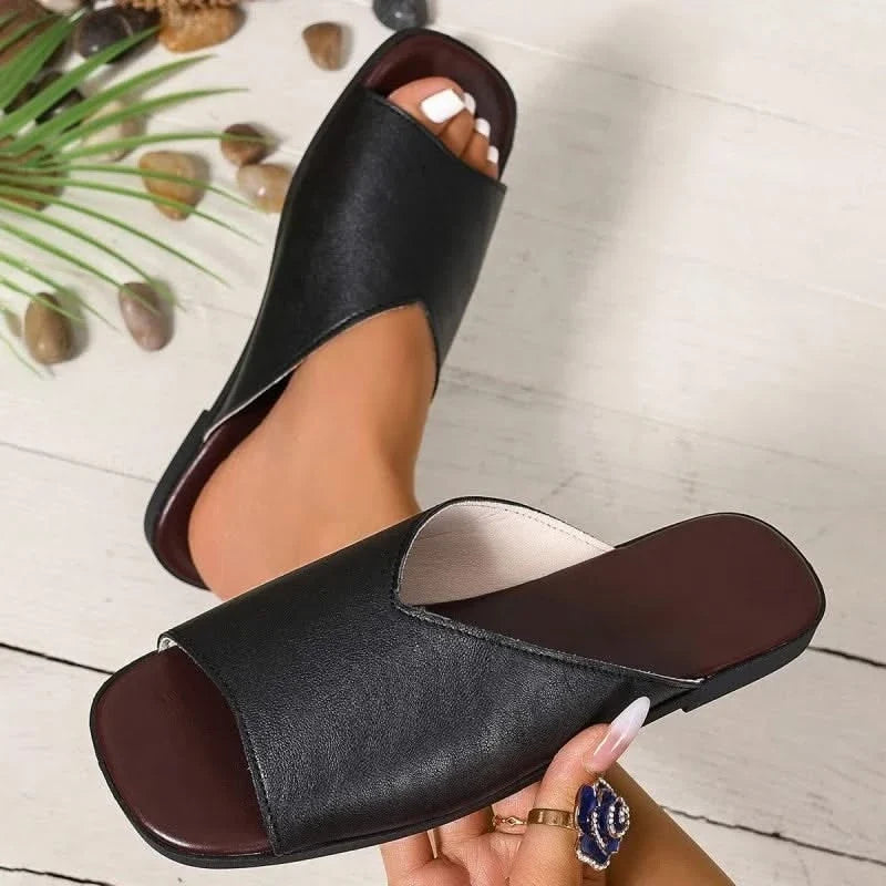Versatile women's open-toe flats, ideal casual footwear for breezy, comfortable summer days.