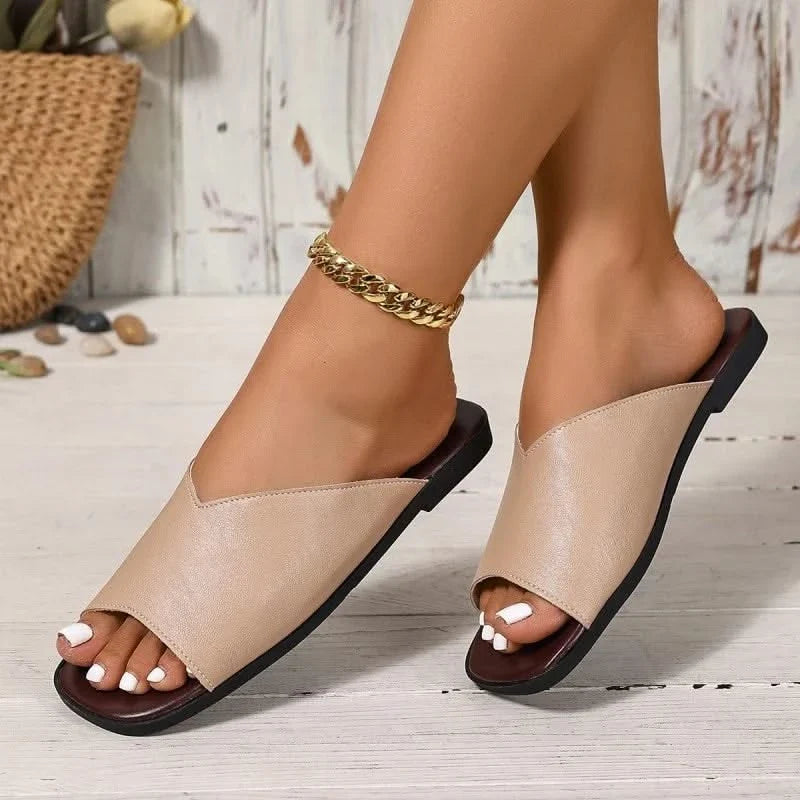 Open-toe women's flats, breathable and comfortable summer shoes for casual slip-on style.