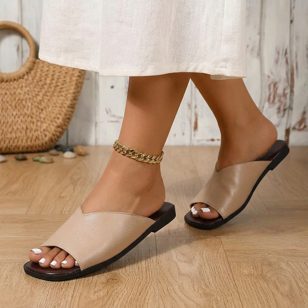 Easy slip-on women's flats with a breezy open-toe, designed for summer comfort and casual wear.