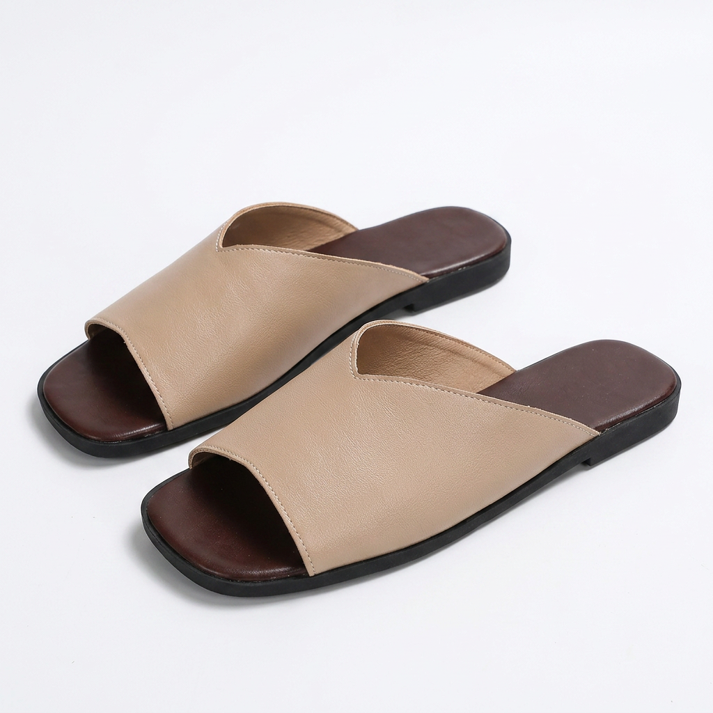 Casual women's open-toe flats, ideal for summer strolls and everyday comfort footwear.