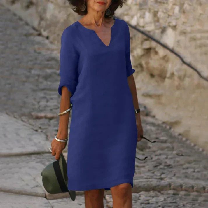 Women's V-neck midi dress, designed for everyday comfort and chic summer fashion. Sleeveless.