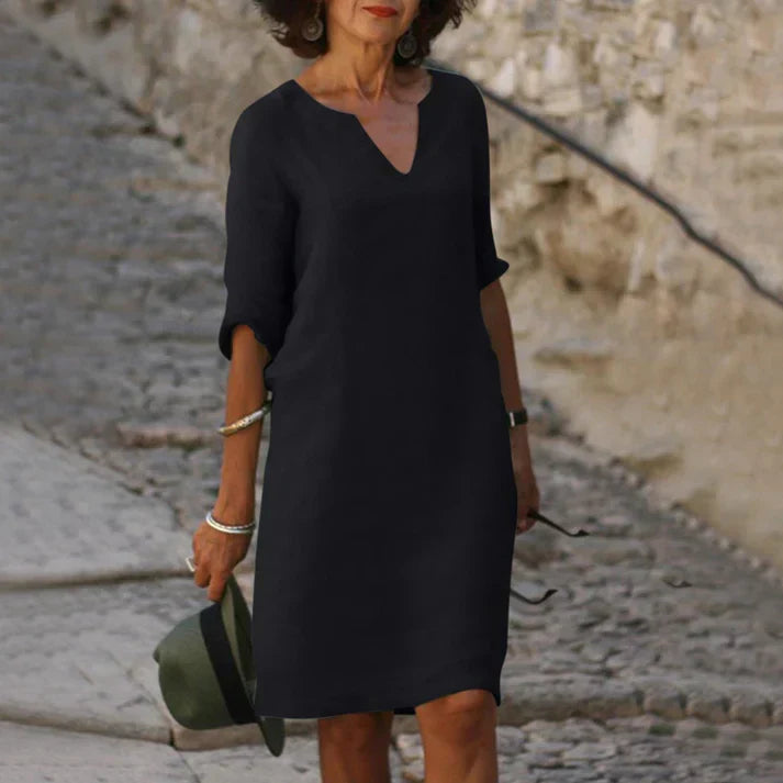 Breezy V-neck midi dress for women, versatile spring to summer style, comfortable & elegant.