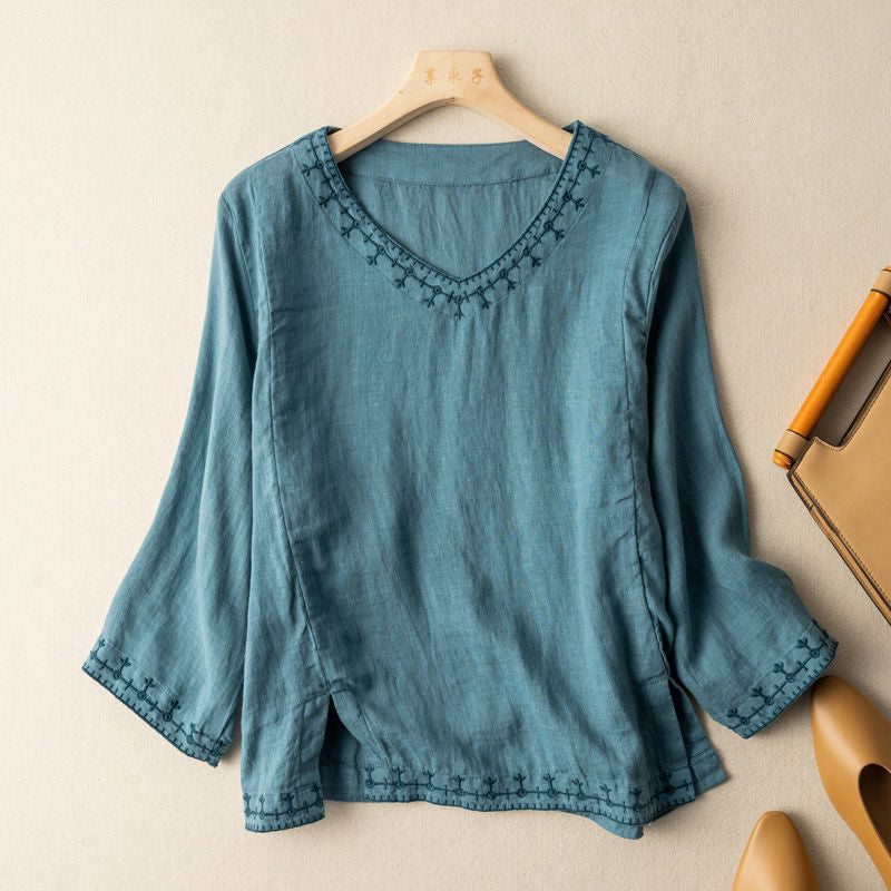 Chic women's teal embroidered blouse, lightweight and relaxed for effortless spring/summer vacation style.