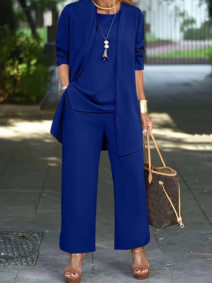Relaxed-fit women's 3-piece outfit: wide-leg trousers, top, and cardigan for a comfortable summer style.