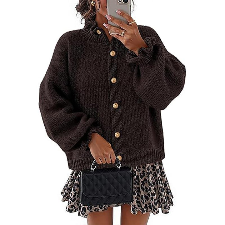 Relaxed fit women's buttoned cardigan sweater, elegant long sleeve knitwear. Comfortable for daily wear.