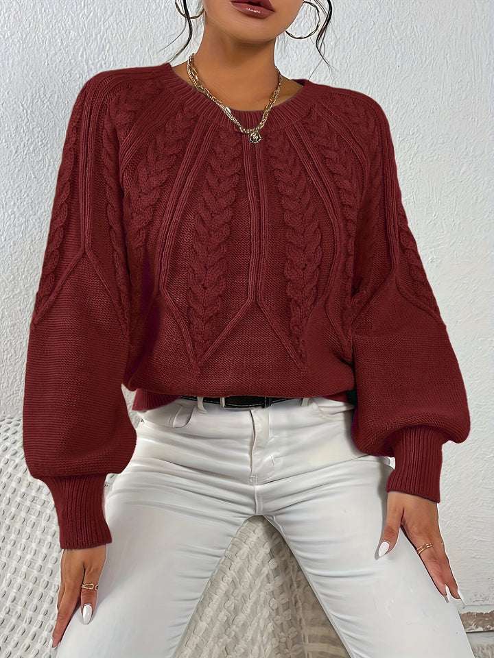 Winter ready women's cable knit sweater, relaxed design, chic lantern sleeves, ultimate comfort.