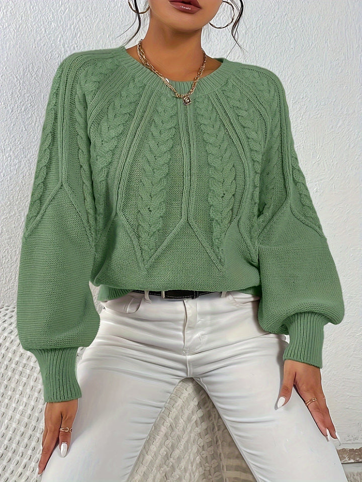 Cozy cable knit women's sweater, relaxed fit, elegant lantern sleeves, ideal for fall fashion.