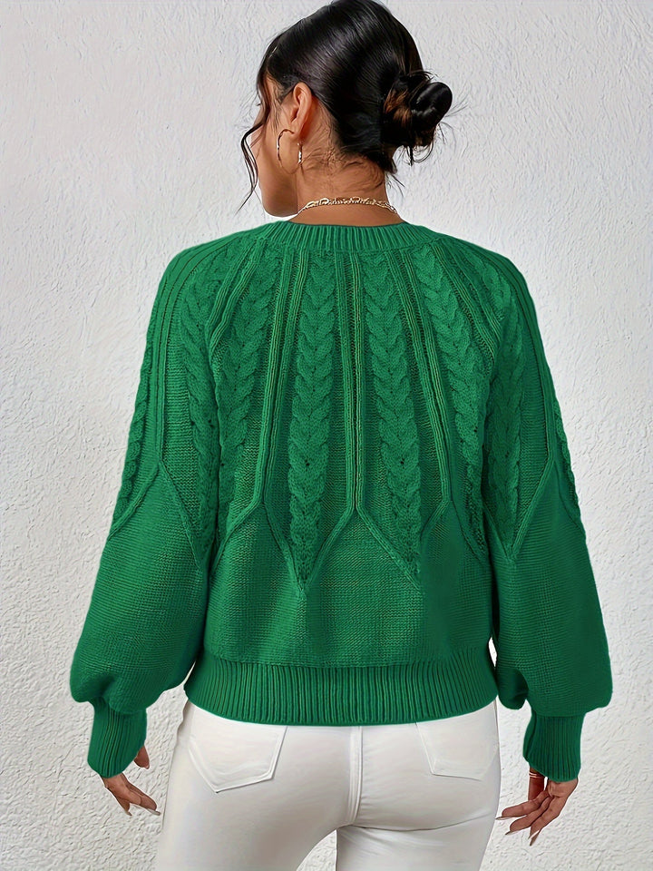 Women's winter style cable knit sweater, relaxed fit, elegant lantern sleeves, warm and fashionable.